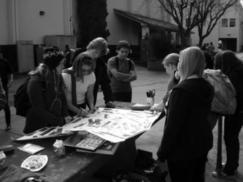 Members of the GSA club put their hurtful labels on a poster to later symbolically destroy.