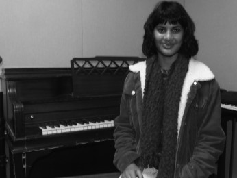 Megan Rao in her element in front of the piano.