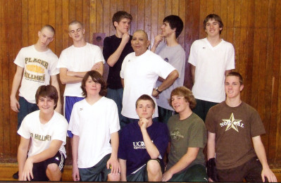 Coach Geno Linarez was well known for creating close relationships with his players. Above Linarez poses with his 2008 JV Boys Volleyball Team.