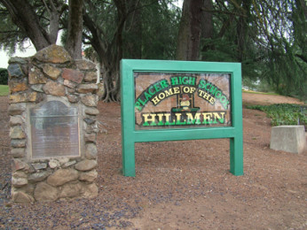 The sign from the 1980s makes a comeback and welcomes students onto campus from its posts on High St. and Agard.