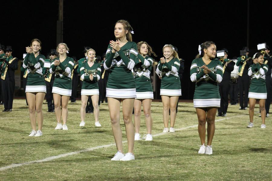 This year’s cheerleading squad performs at the Homecoming game.  Some students wonder why they limit their appearances to just football and basketball.