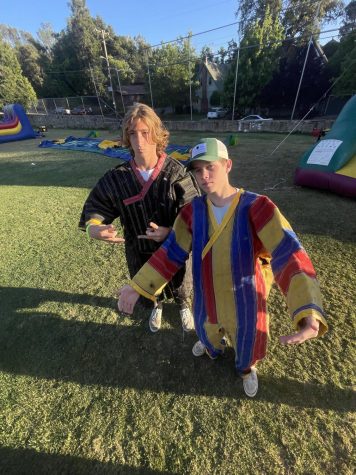 Harper Winans and Keffer Abs enjoy the bouncy houses at Palooza.